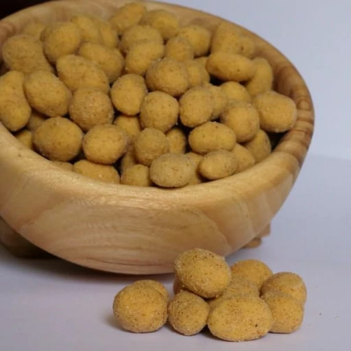 تصویر 2 از بادام زمینی روکشدار فلفلی دراژه با پوشش ترد و طعم پرقدرت ادویه ای